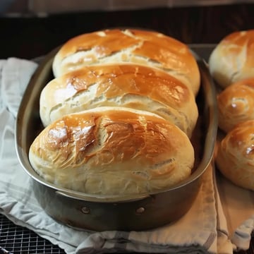 A pan of bread rolls, ready to be baked.